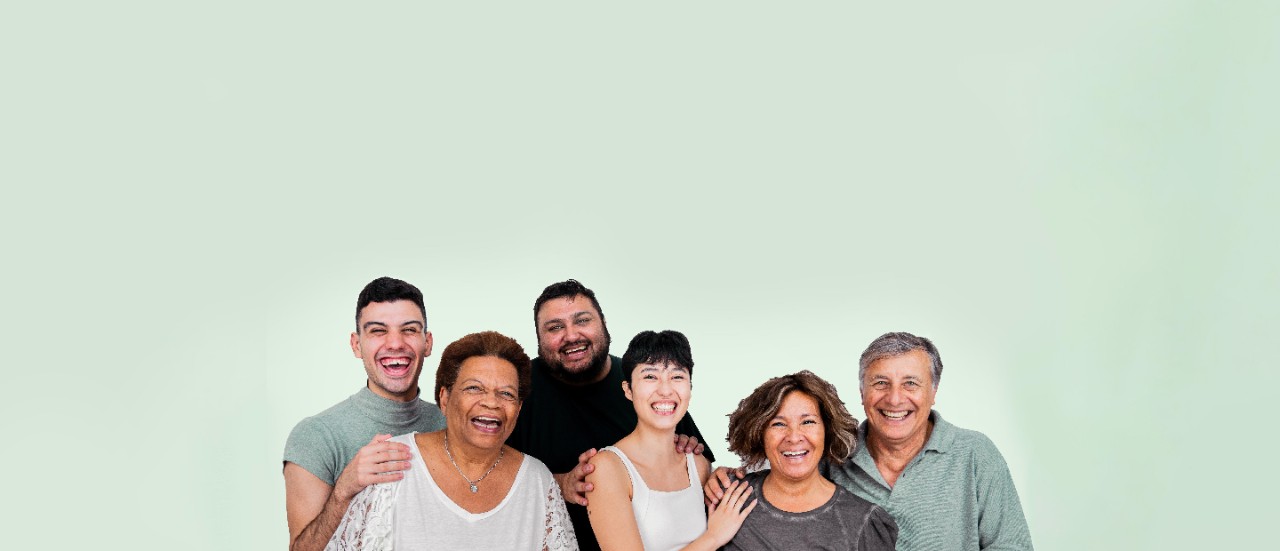 Diverse group of people with a plain green background