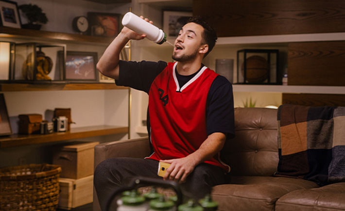 Image of sports better taking a break and drinking water